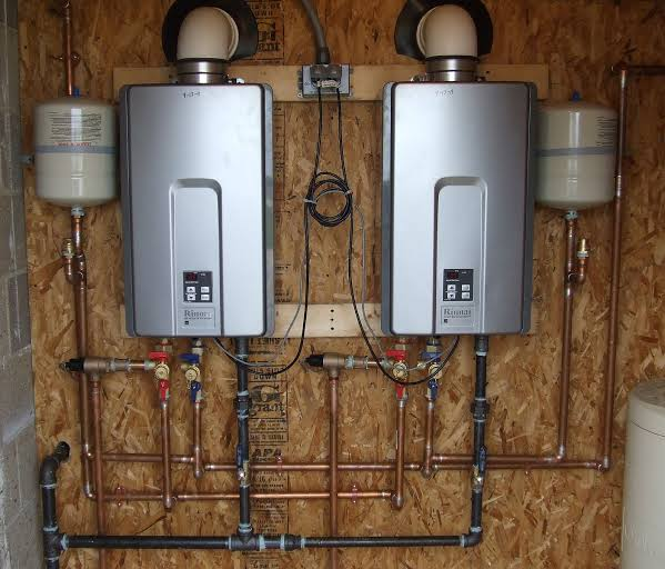 Professional installation of a tankless water heater in a Seattle home

